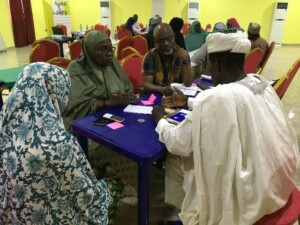 IHP State Director, Dr Usmnan Gebbi, and participants discuss progress, challenges, and solutions for OF, Birnin-Kebbi, Kebbi State, Nigeria. Photo Credit: Morgan Mickle