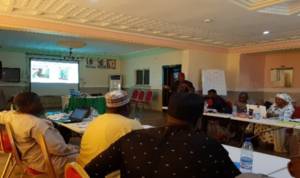 Participants listen to presentations during the State Committee on Food & Nutrition Meeting, Kamba Town, Kebbi State, Nigeria (Photo Credit: Nafisa Zaki-GSICEA)